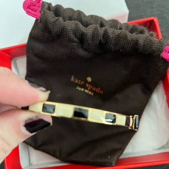 Kate Spade black and gold bow bracelet. - Picture 2 of 4